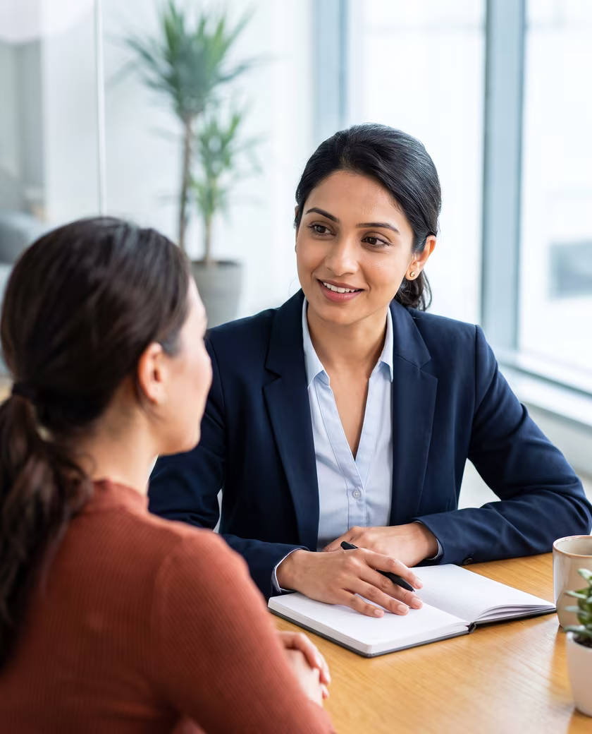 A consultant talking with a client about their team’s goals